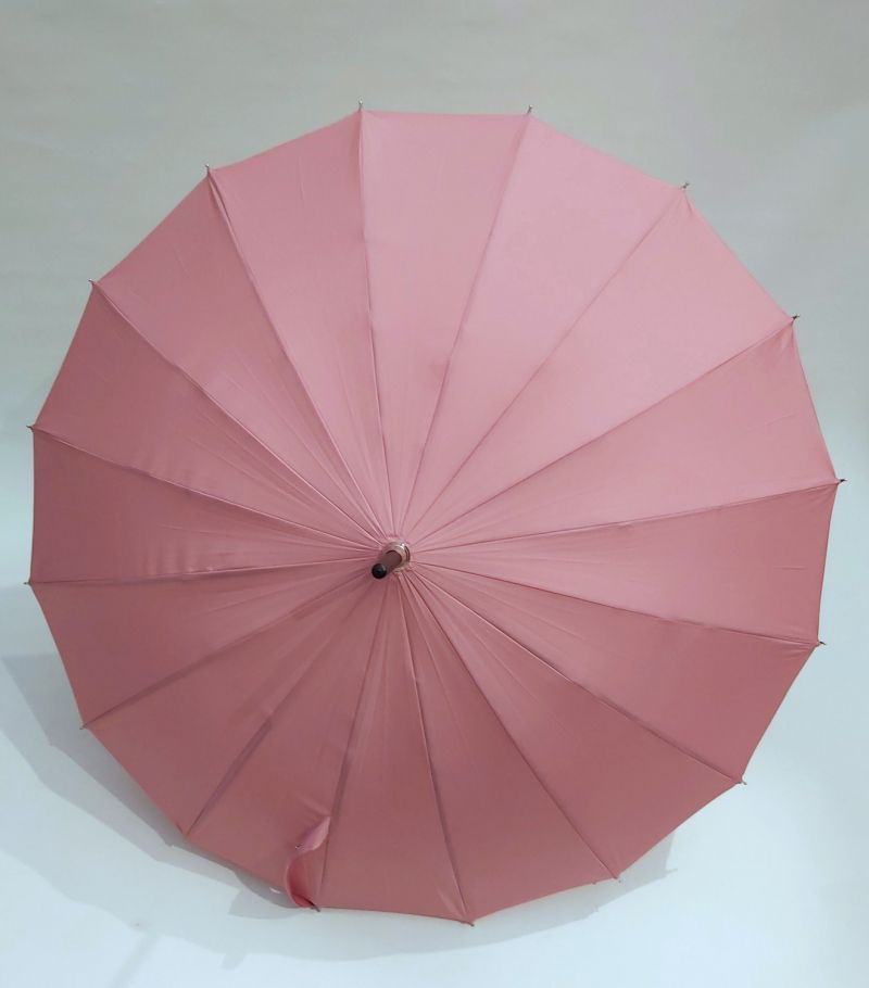 Petit parapluie long anti uv 50+ à 97% uni rose 16 branches Choupinette, légère & solide