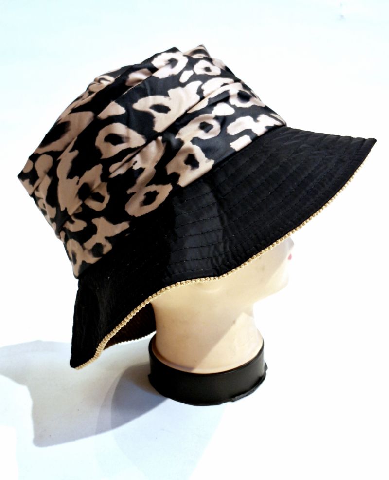 Chapeau de pluie tissu souple imprimé léopard - Souple TL 57/58 imperméable