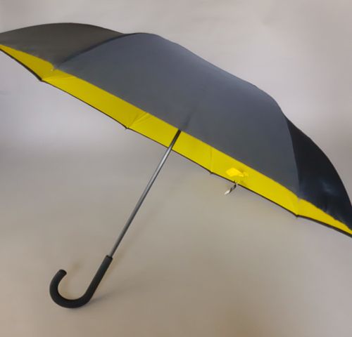 Parapluie inversé anti uv à 100% noir doublé jaune uni français par Neyrat Autun, léger et solide