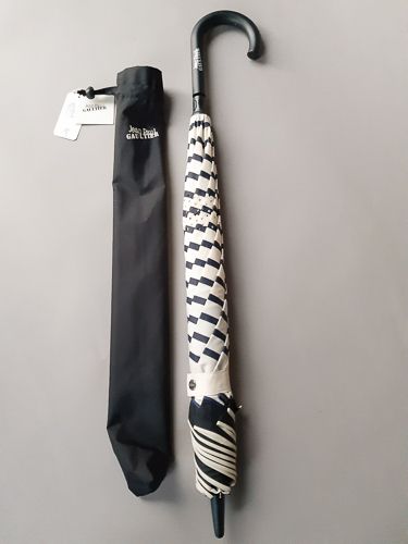 Parapluie inversé Jean Paul Gaultier noir doublé marinière ivoire et bleu marine, léger et élégant