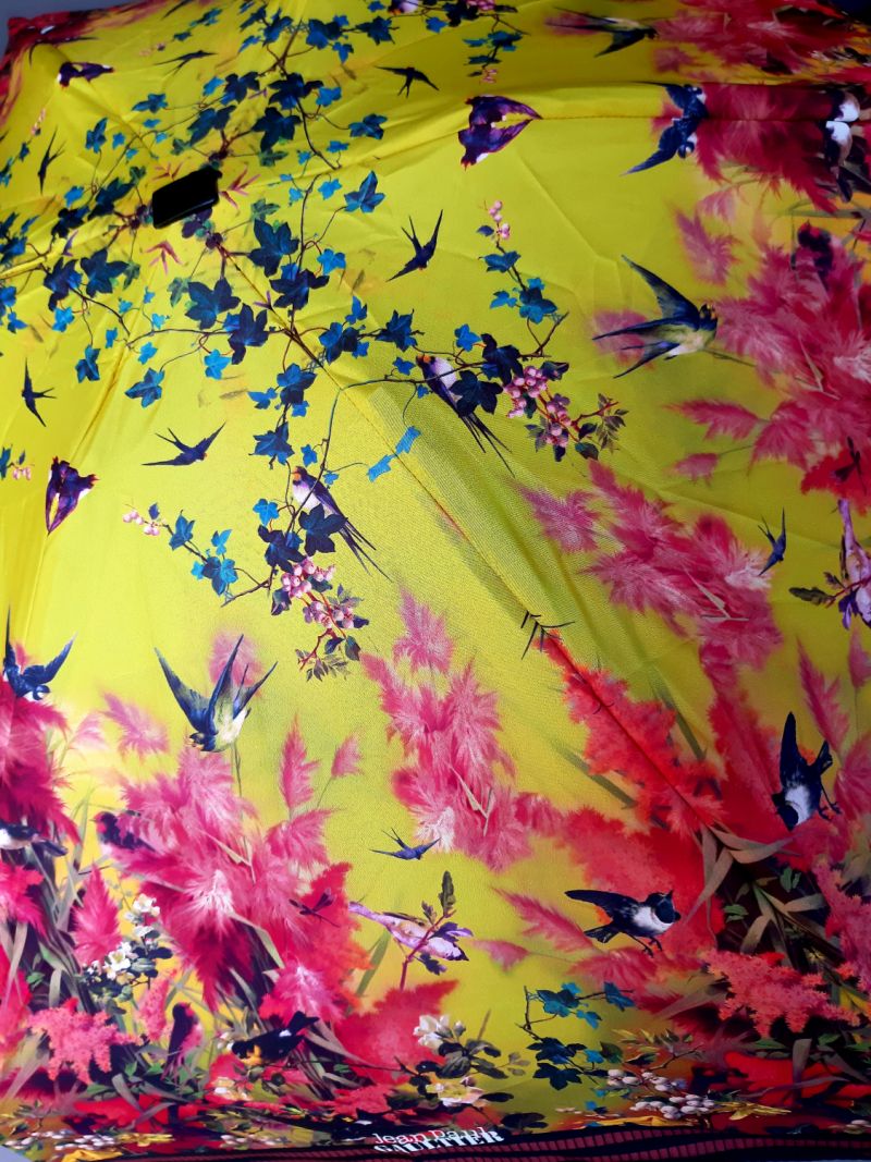 parapluie jean Paul Gaultier micro plat de poche orange fleurs oiseaux pochon imperméable, léger et résistant