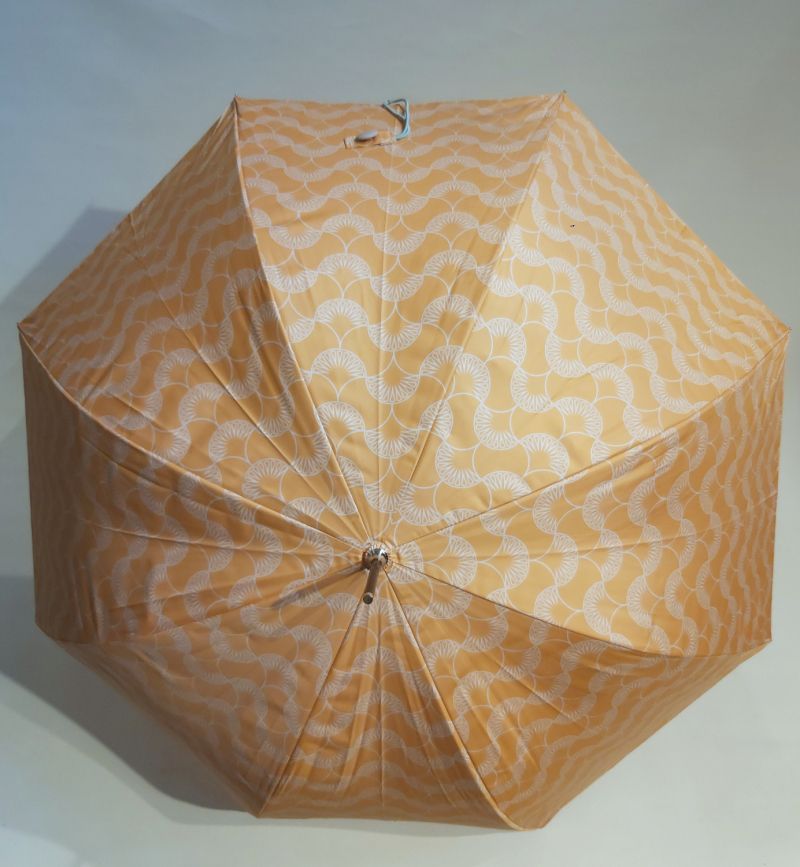  Parapluie anti uv orange sur éventail blanc protection UPF50+, léger et pas cher