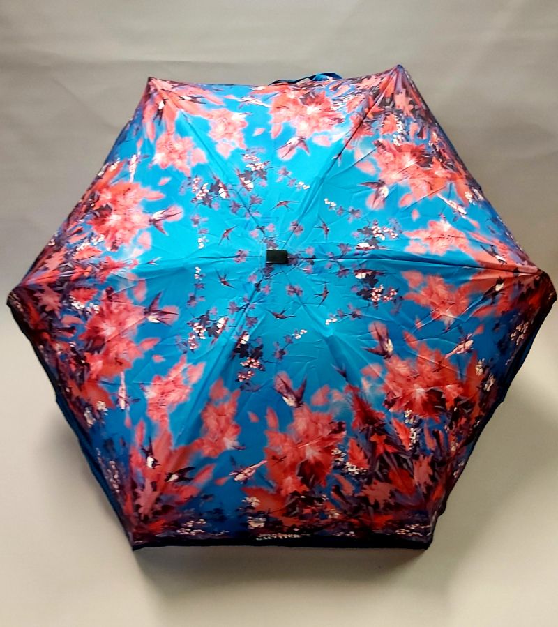 parapluie jean Paul Gaultier micro plat de poche bleu fleurs oiseaux pochon imperméable, léger et résistant
