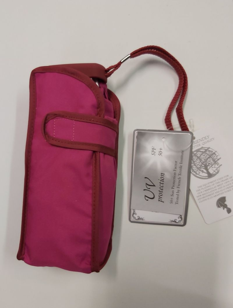  parapluie anti uv mini pliant uni fuchsia par Guy de Jean, léger et solide
