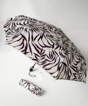 Mini parapluie anti uv UPF 50+ pliant automatique ivoire imprimé de feuilles "volupté" Piganiol, élégant et résistant