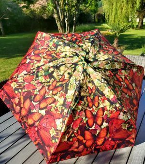 parapluie jean Paul Gaultier mini plat de poche papillons rouge et orange pochon étanche, léger et solide