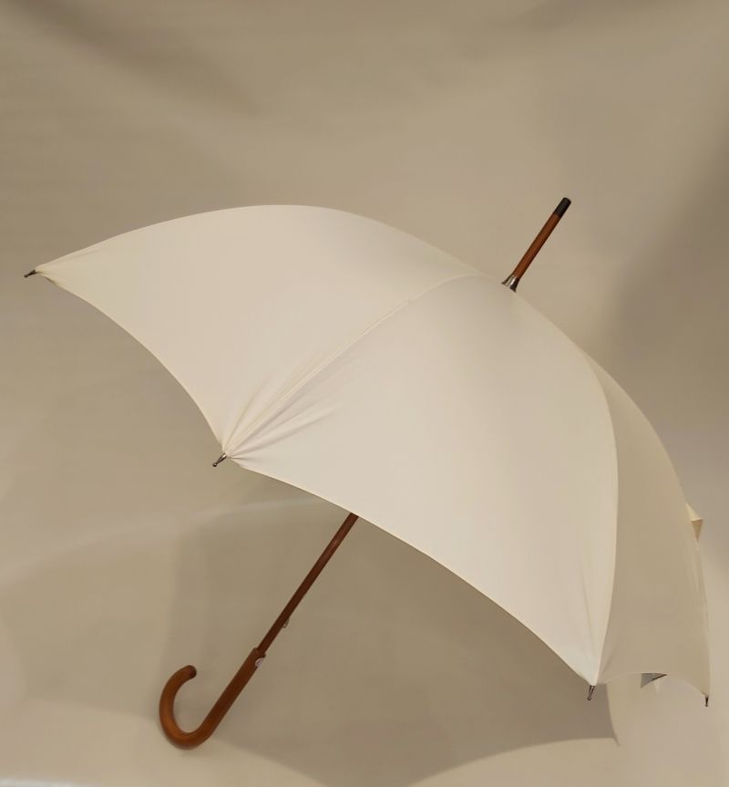Parapluie canne manuel uni ivoire sa poignée courbe bois Guy de Jean, anti uv 95% et résistant