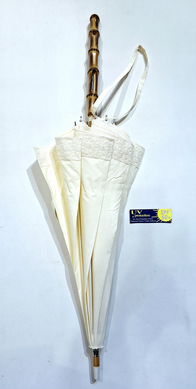 Ombrelle droite dentelle anti uv UPF50+ à 97% en coton ivoire poignée Bambou française - légère et solide