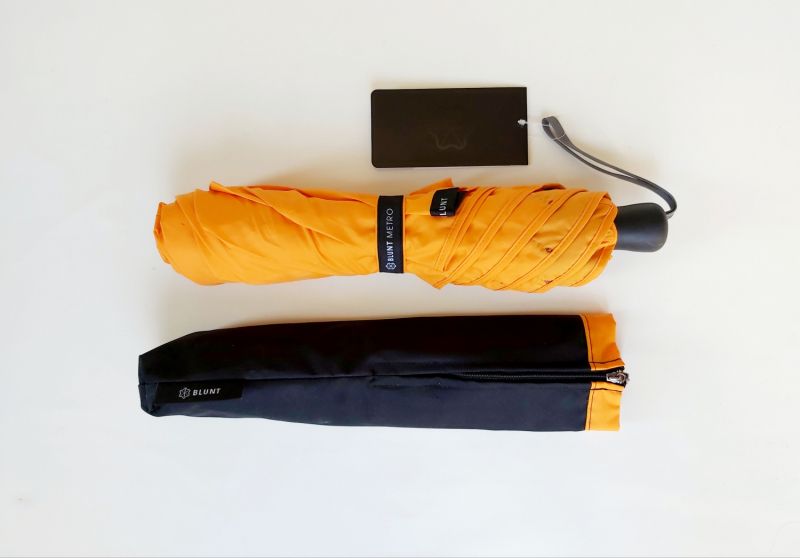 Parapluie Blunt XS Metro pliant uni orange, léger 410g et anti vent