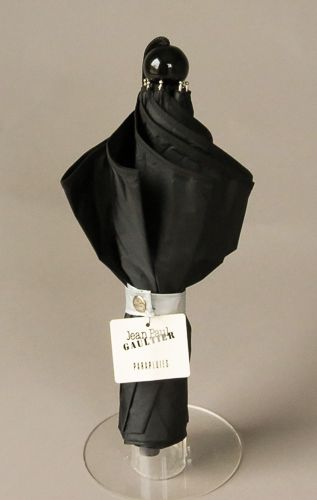 Parapluie JP Gaultier pliant automatique noir doublé argent avec un motif de visages et silhouette par Cocteau, pliant et robuste