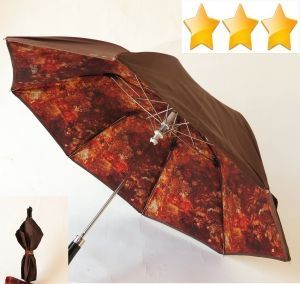 Parapluie Jean Paul Gaultier pliant automatique doublé chocolat et interieur à motif floral, robuste et français